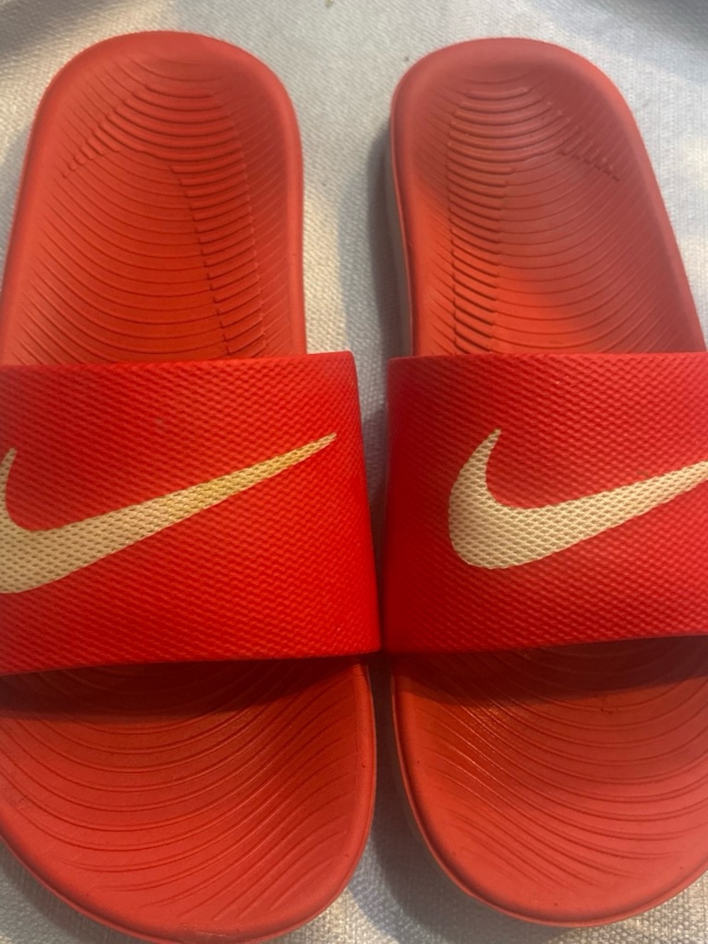 Nike Kids Red Slide Sandals with grey Swoosh